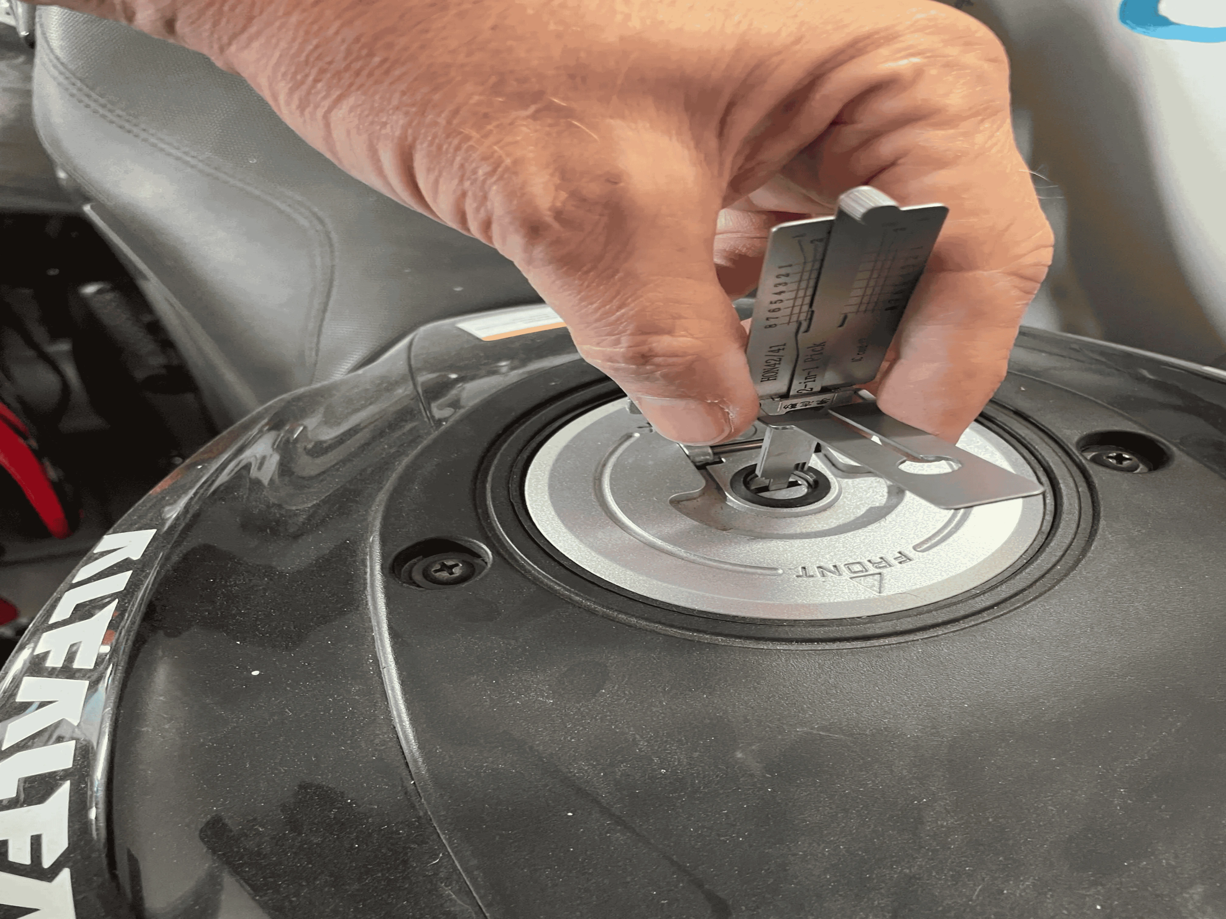 Motorcycle gas cap key